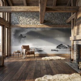 Carta da parati fotografica Un Altro Passo: stile reportage anni '50 bianco e nero. Alpinista solitario nella tormenta che avanza faticosamente verso una baita alpina sommersa dalla neve. Atmosfera drammatica ispirata a Walter Bonatti.